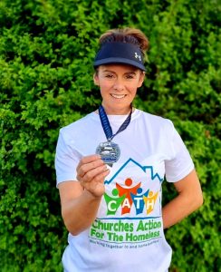 Ysabelle pictured with her medal for completing the Edinburgh Marathon